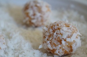 Rolling the balls in coconut. 